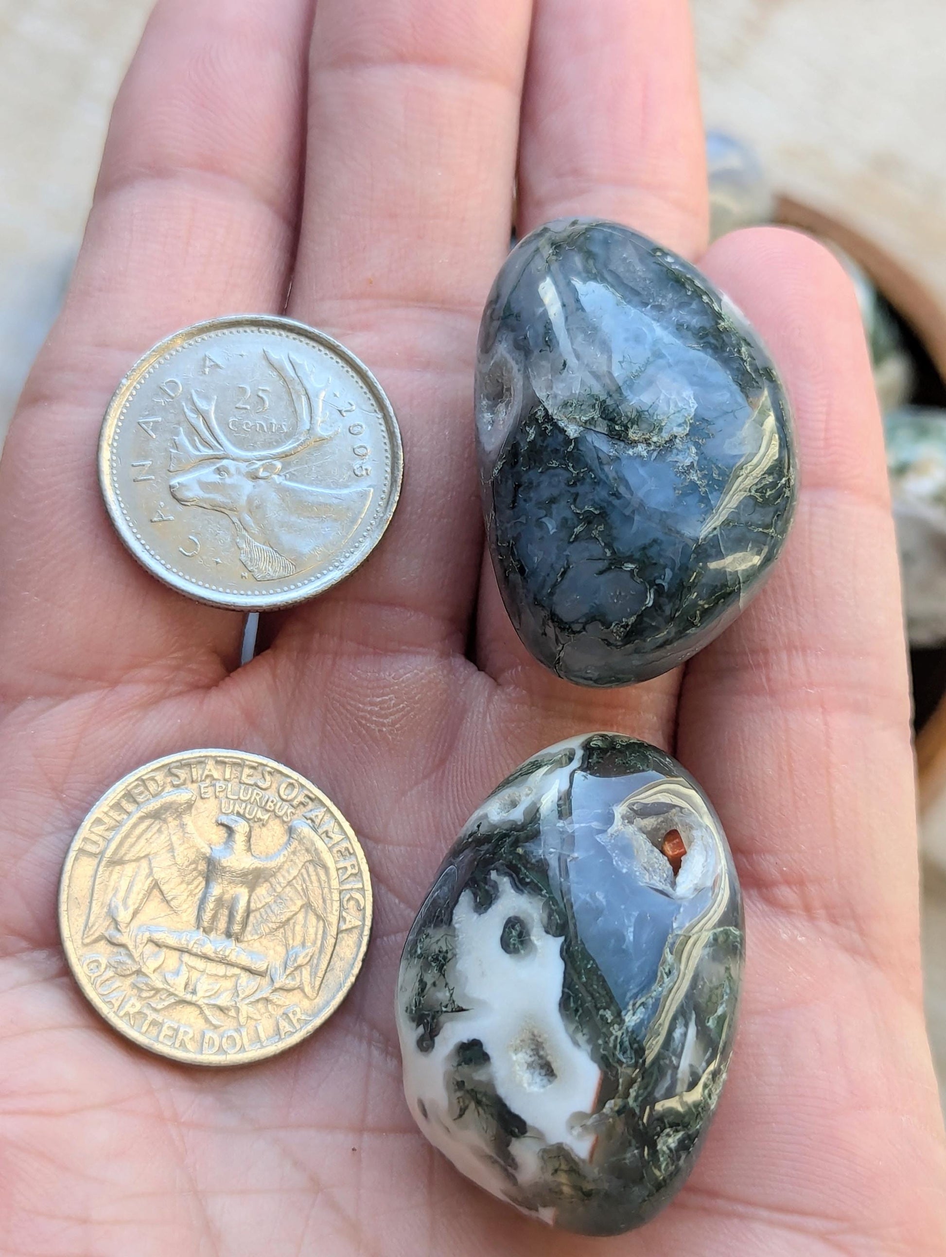 Polished moss agate stones