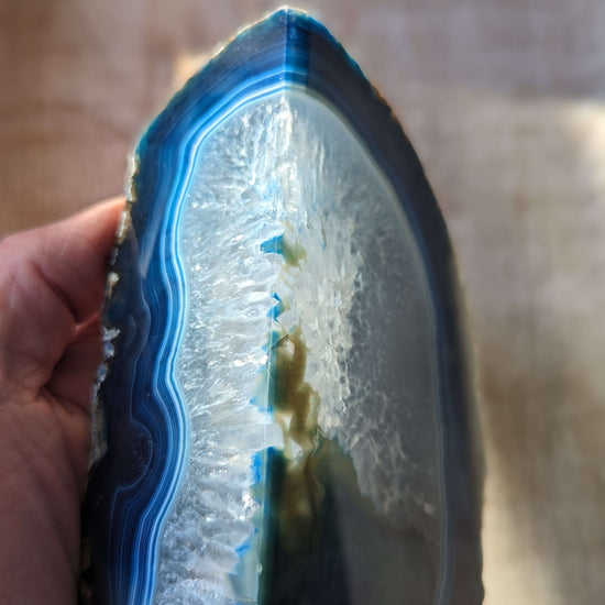 Blue-agate-bookend-in-hand