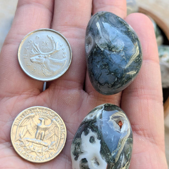 Polished moss agate stones
